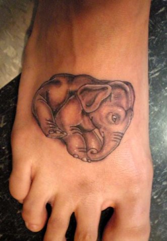 Фото и значение татуировки " Слон ". X_141f5996